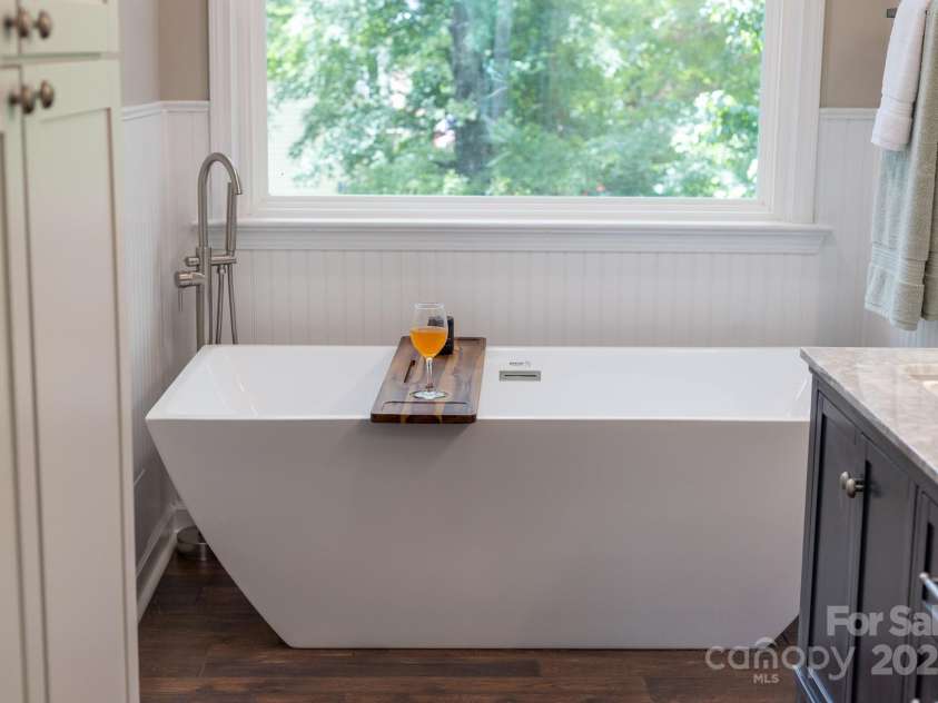 5408 Apple Glen Drive, Harrisburg, NC 28075.  MLS# CAR4273916, YatesRealty ID 32295. Soaking tub in master ensuite bath