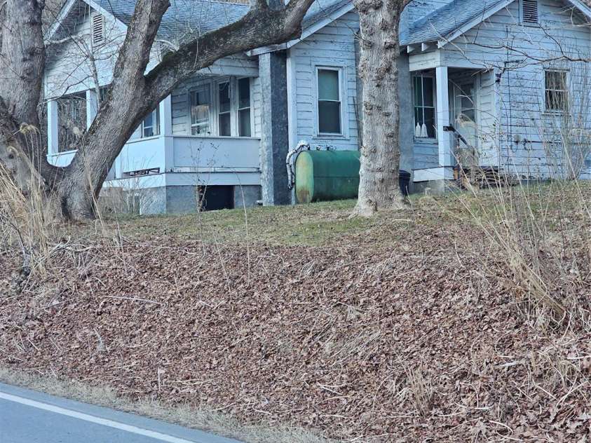 1820 Grapevine Road, Marshall, NC 28753.  MLS# CAR4219221, YatesRealty ID 3230. 1932 farmhouse