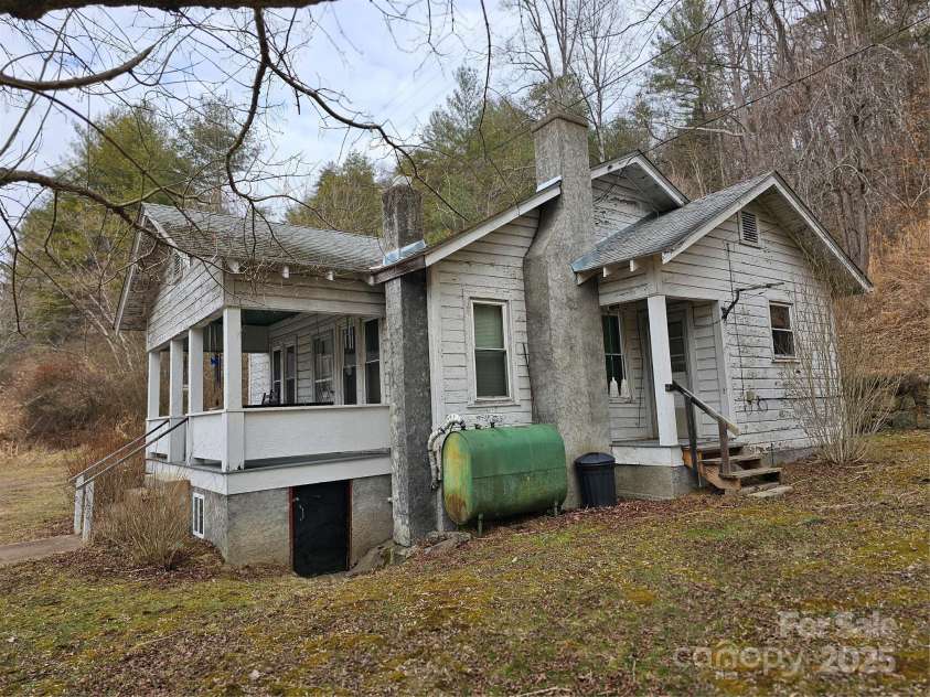 1820 Grapevine Road, Marshall, NC 28753.  MLS# CAR4219221, YatesRealty ID 3230. Farmhouse furnace replaced in 2014