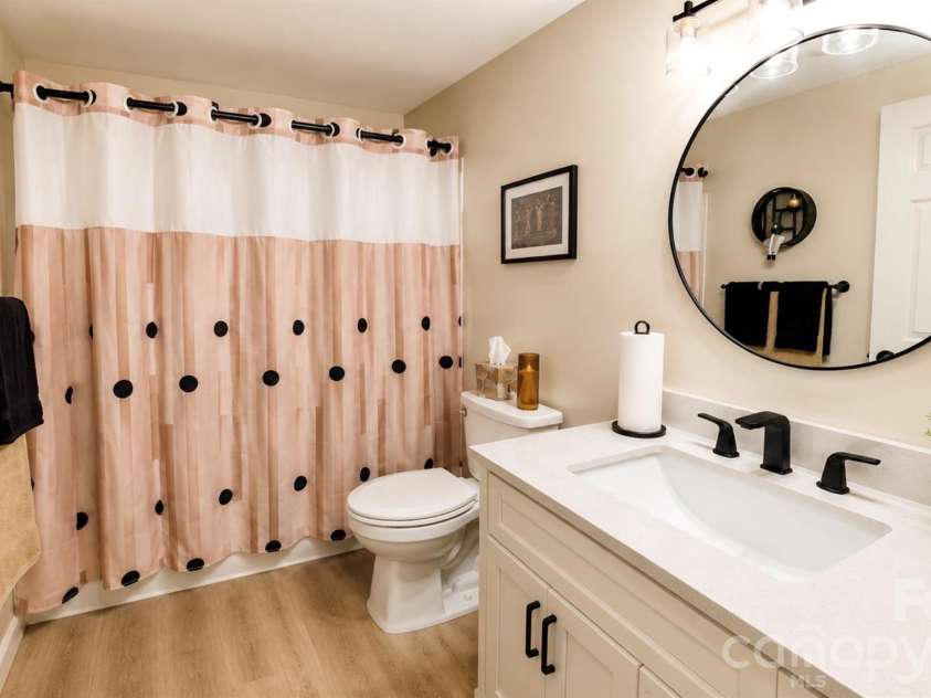 2698 Connestee Trail, Brevard, NC 28712.  MLS# CAR4371714, YatesRealty ID 32300. Secondary bathroom shared by 2nd and 3rd bedrooms