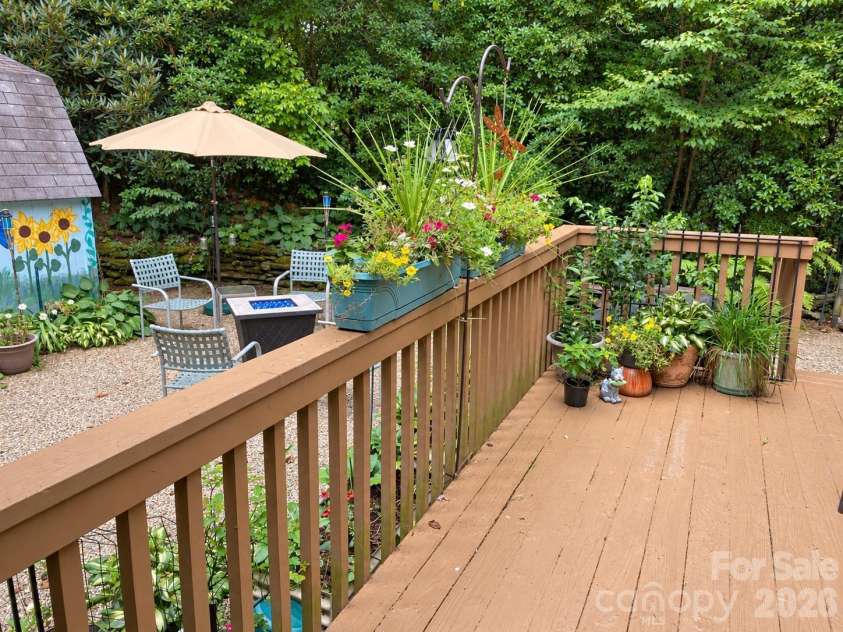 2698 Connestee Trail, Brevard, NC 28712.  MLS# CAR4371714, YatesRealty ID 32300. Sunny back deck, perfect for plants and relaxing