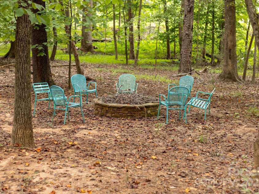 14504 Henry Harrison Stillwell Drive, Huntersville, NC 28078.  MLS# CAR4288907, YatesRealty ID 32304. Fire pit