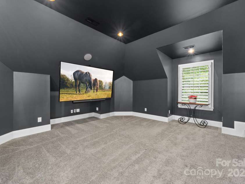 14504 Henry Harrison Stillwell Drive, Huntersville, NC 28078.  MLS# CAR4288907, YatesRealty ID 32304. Theatre room