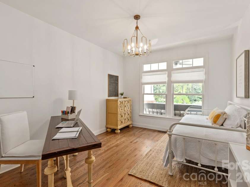 869 Stratford Run Drive, Fort Mill, SC 29708.  MLS# CAR4364217, YatesRealty ID 32304. Guest bedroom on the main floor