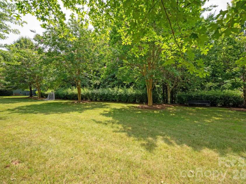 869 Stratford Run Drive, Fort Mill, SC 29708.  MLS# CAR4364217, YatesRealty ID 32304. Pocket park in front of the house