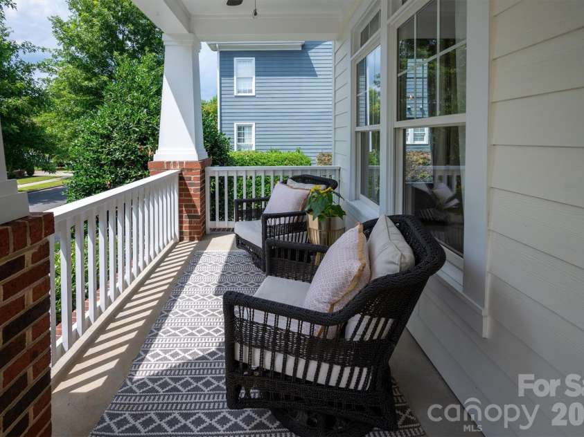 869 Stratford Run Drive, Fort Mill, SC 29708.  MLS# CAR4364217, YatesRealty ID 32304. Southern front porch