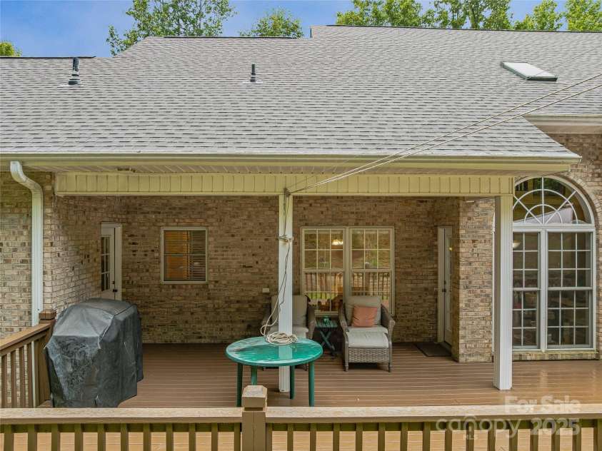 808 Old Fort Road, Fairview, NC 28730.  MLS# CAR4281084, YatesRealty ID 32308. A view of a covered area on the back deck - plenty of open deck for grilling as well!