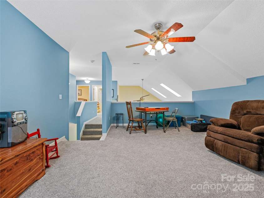 808 Old Fort Road, Fairview, NC 28730.  MLS# CAR4281084, YatesRealty ID 32308. Enjoy this open lofted den upstairs. A perfect hobby room!
