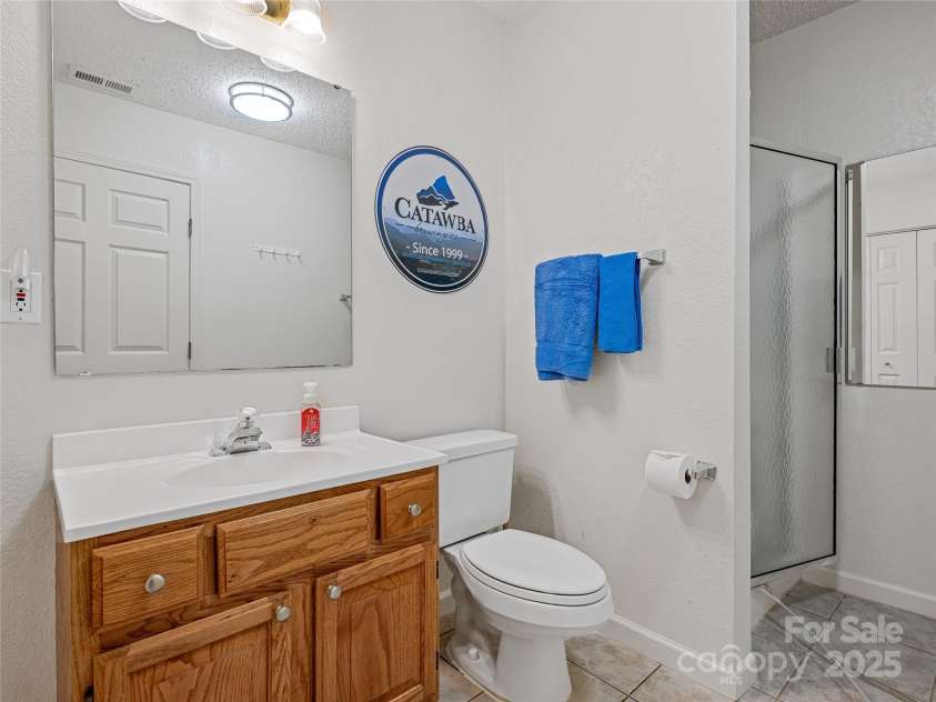 808 Old Fort Road, Fairview, NC 28730.  MLS# CAR4281084, YatesRealty ID 32308. Lower Level has full bath with walkin shower.