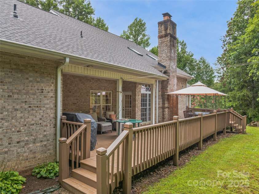 808 Old Fort Road, Fairview, NC 28730.  MLS# CAR4281084, YatesRealty ID 32308. The back yard is fenced and provides easy access for Fido.