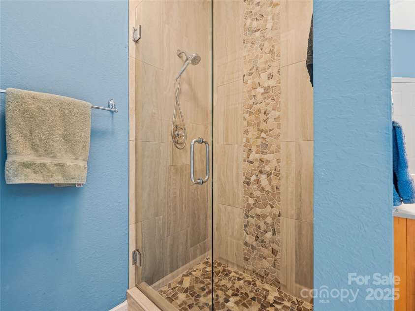 808 Old Fort Road, Fairview, NC 28730.  MLS# CAR4281084, YatesRealty ID 32308. Who doesn't love a spa shower. So pretty!