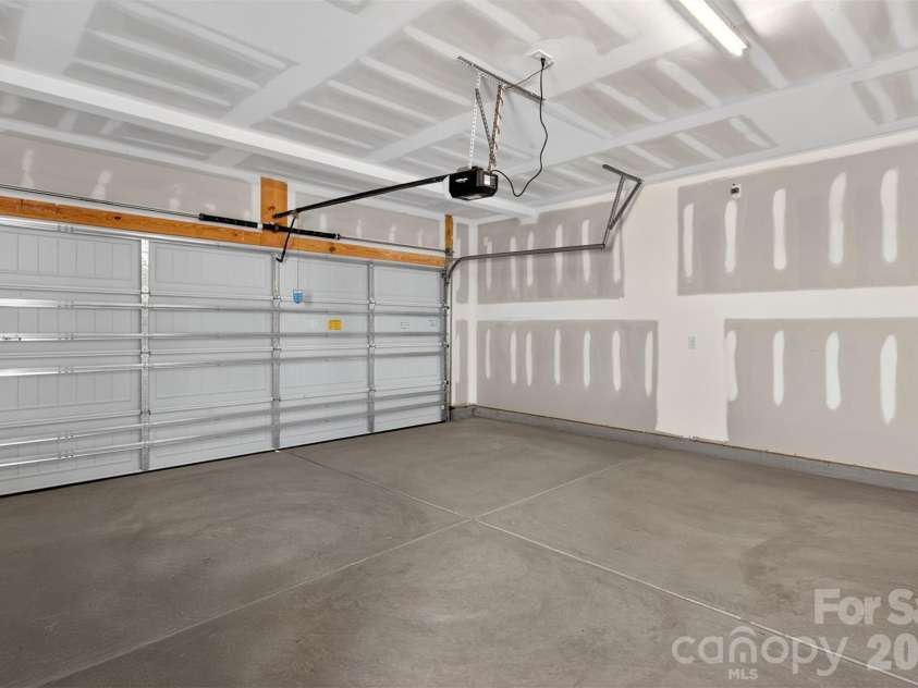 4036 Zinnia Drive, Harrisburg, NC 28075.  MLS# CAR4292830, YatesRealty ID 3231. Garage 
