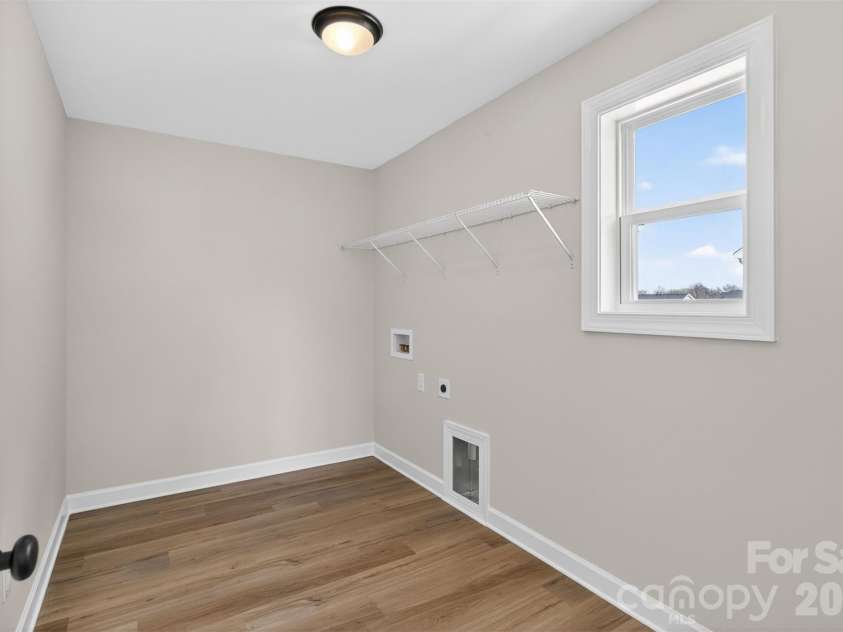 4036 Zinnia Drive, Harrisburg, NC 28075.  MLS# CAR4292830, YatesRealty ID 3231. Laundry Room