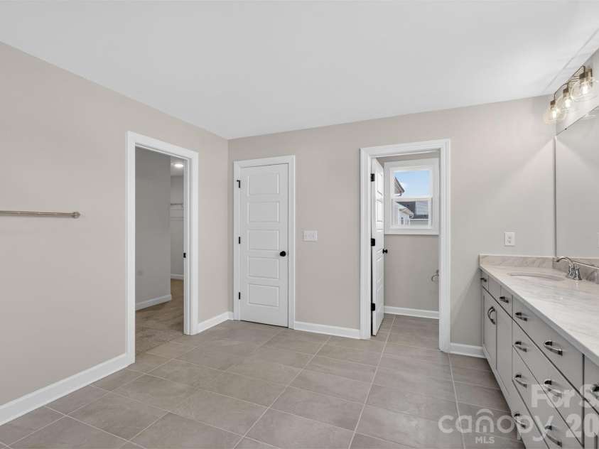 4036 Zinnia Drive, Harrisburg, NC 28075.  MLS# CAR4292830, YatesRealty ID 3231. Premier Bath