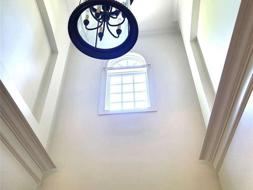 8914 Landsdowne Avenue, Harrisburg, NC 28075.  MLS# CAR4259422, YatesRealty ID 3231. Beautiful picture windows and a high ceiling.