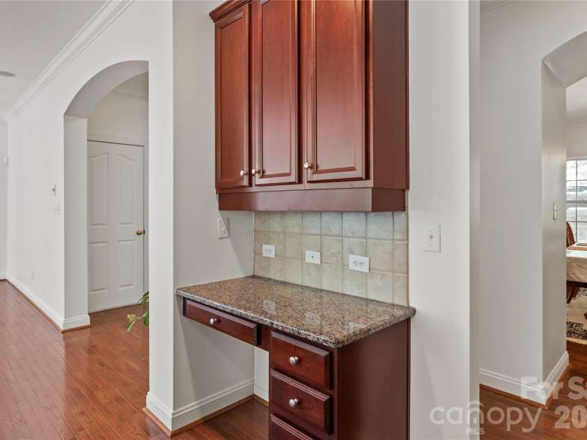 8914 Landsdowne Avenue, Harrisburg, NC 28075.  MLS# CAR4259422, YatesRealty ID 3231. Computer desk area to  where you can look for all your favorite recipes.