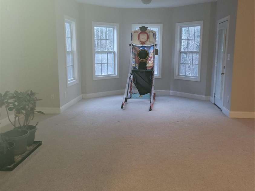 8914 Landsdowne Avenue, Harrisburg, NC 28075.  MLS# CAR4259422, YatesRealty ID 3231. Partial view of entertainment room in basement.