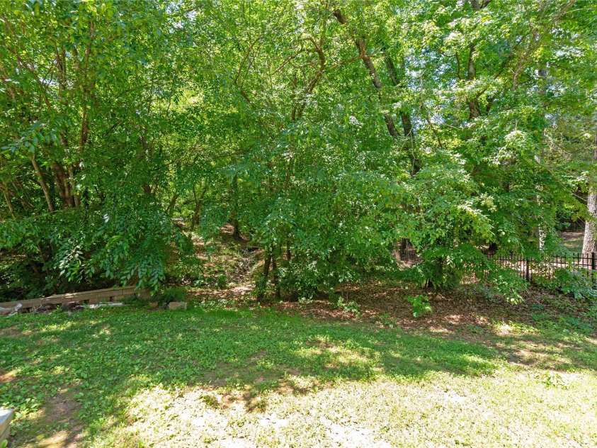 8914 Landsdowne Avenue, Harrisburg, NC 28075.  MLS# CAR4259422, YatesRealty ID 3231. View of back yard.