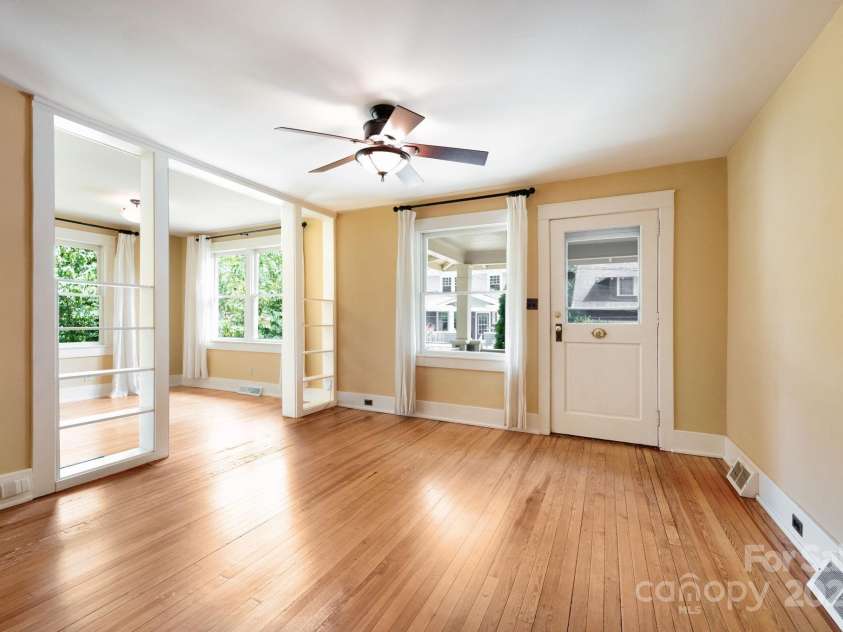 30 Monroe Place, Asheville, NC 28801.  MLS# CAR4284372, YatesRealty ID 32311. Abundance of Windows Bring Natural Light