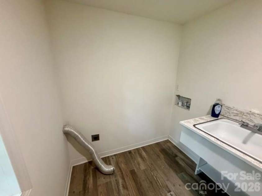 845 Cherokee Place, Lenoir, NC 28645.  MLS# CAR4425267, YatesRealty ID 32314. Laundry with sink