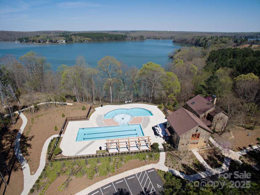 360 Picasso Trail, Mount Holly, NC 28120.  MLS# CAR4289859, YatesRealty ID 32319. Lakeside with Multiple Heated Pools