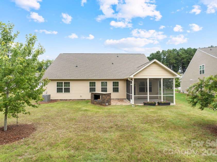 360 Picasso Trail, Mount Holly, NC 28120.  MLS# CAR4289859, YatesRealty ID 32319. Screened-In Porch and Patio with Fireplace