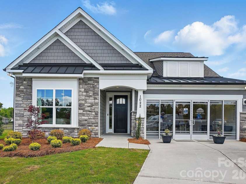 1022 Heritage Pointe, Indian Trail, NC 28079.  MLS# CAR4396519, YatesRealty ID 32322. Model Home at Lot 303 features a Wescott D floorplan