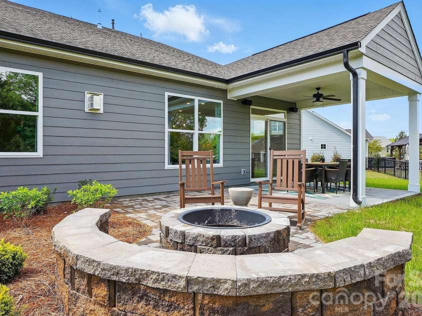 1022 Heritage Pointe, Indian Trail, NC 28079.  MLS# CAR4396519, YatesRealty ID 32322. Outdoor Living Package with firepit