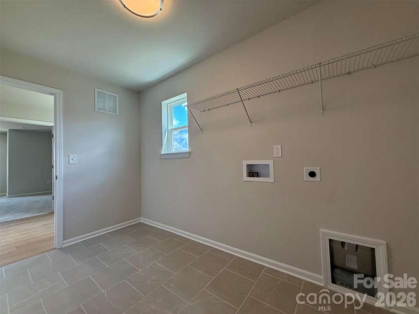 1947 Thicket Drive, Gastonia, NC 28054.  MLS# CAR4382984, YatesRealty ID 32323. Laundry Room