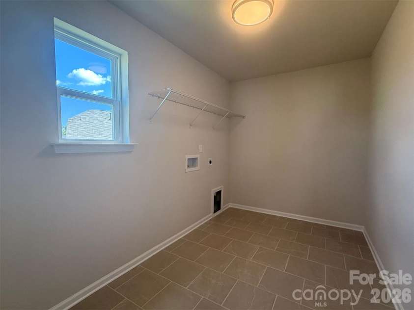 1947 Thicket Drive, Gastonia, NC 28054.  MLS# CAR4382984, YatesRealty ID 32323. Laundry Room