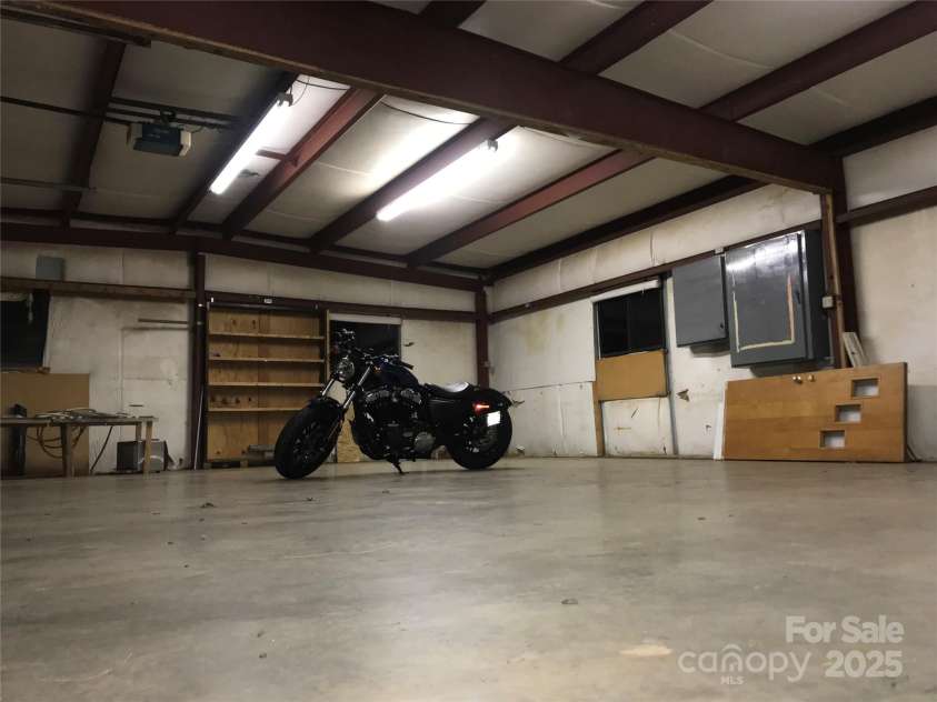 124 & 128 Market Road, Mooresville, NC 28115.  MLS# CAR4274753, YatesRealty ID 32324. Garage/shop