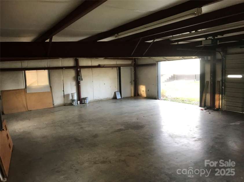 124 & 128 Market Road, Mooresville, NC 28115.  MLS# CAR4274753, YatesRealty ID 32324. Garagge/shop