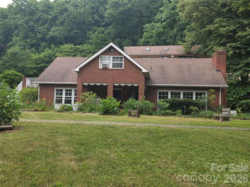 78 Brooks Cove Road, Candler, NC 28715.  MLS# CAR4396533, YatesRealty ID 32325. 