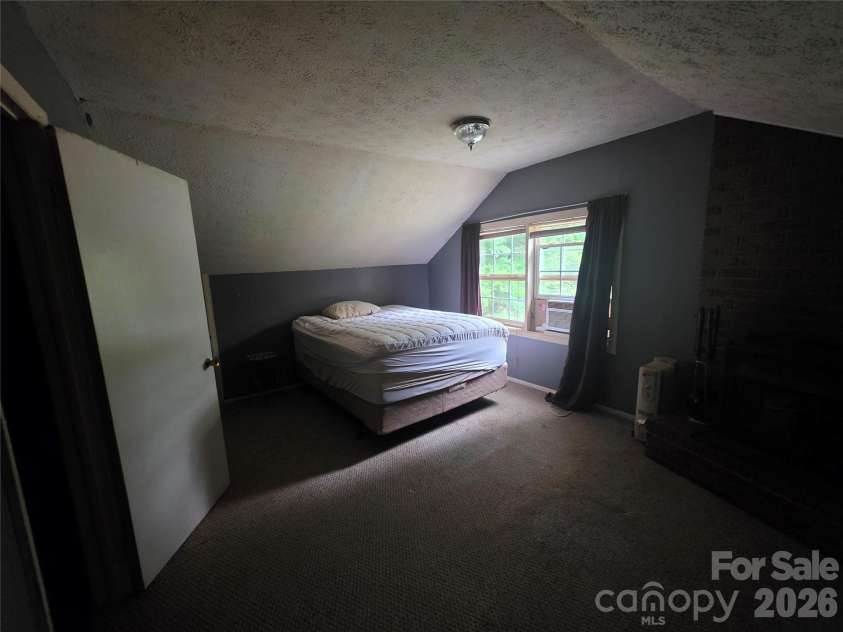 78 Brooks Cove Road, Candler, NC 28715.  MLS# CAR4396533, YatesRealty ID 32325. 