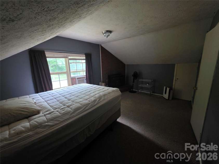 78 Brooks Cove Road, Candler, NC 28715.  MLS# CAR4396533, YatesRealty ID 32325. 