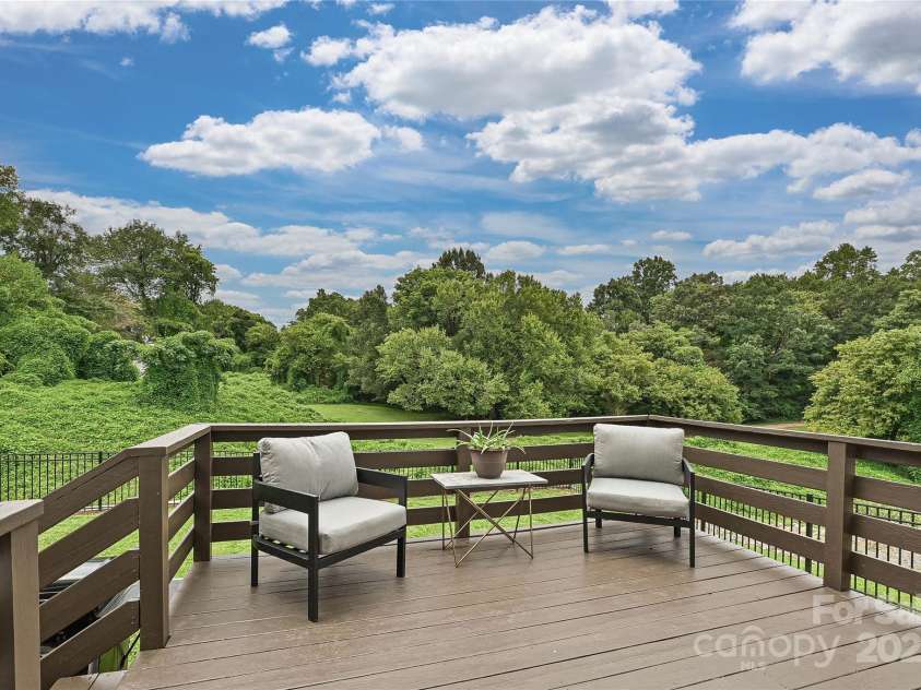 105 Howe Street, Belmont, NC 28012.  MLS# CAR4288261, YatesRealty ID 32331. Deck overlooking private backyard