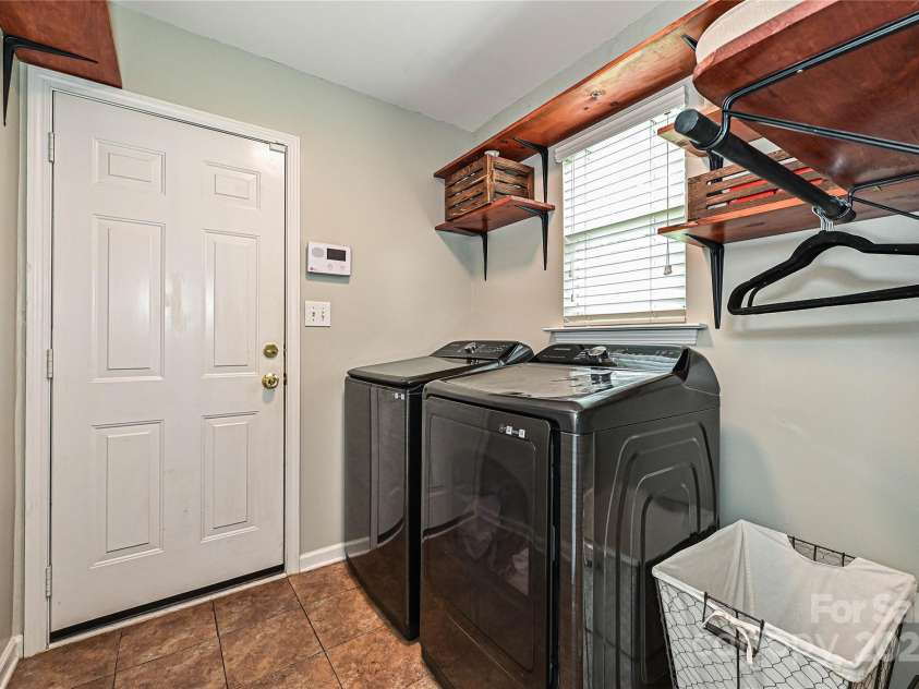 105 Howe Street, Belmont, NC 28012.  MLS# CAR4288261, YatesRealty ID 32331. Laundry room on main floor