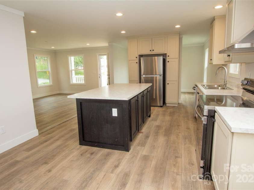 161 Ferguson Street, Canton, NC 28716.  MLS# CAR4291988, YatesRealty ID 32347. Kitchen looking towards Living Room & Dining Room