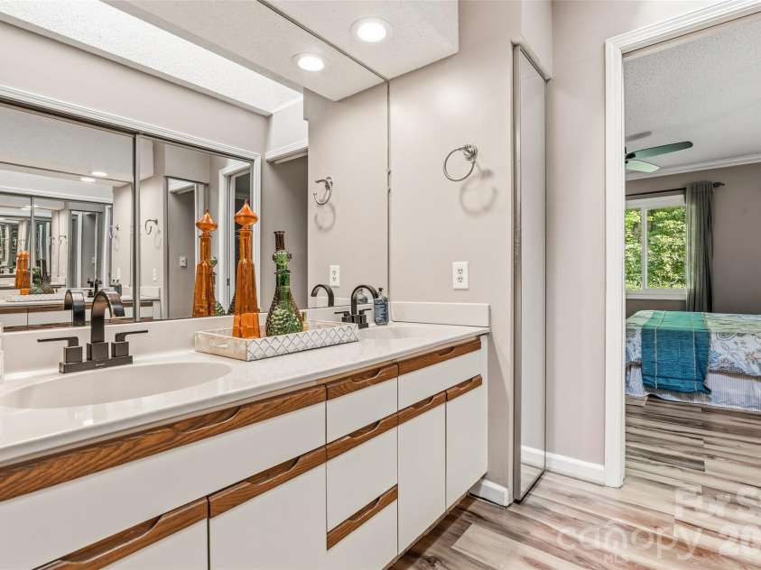 16 Canterbury Drive, Arden, NC 28704.  MLS# CAR4396207, YatesRealty ID 32349. Large double sink vanity with additional storage on end
