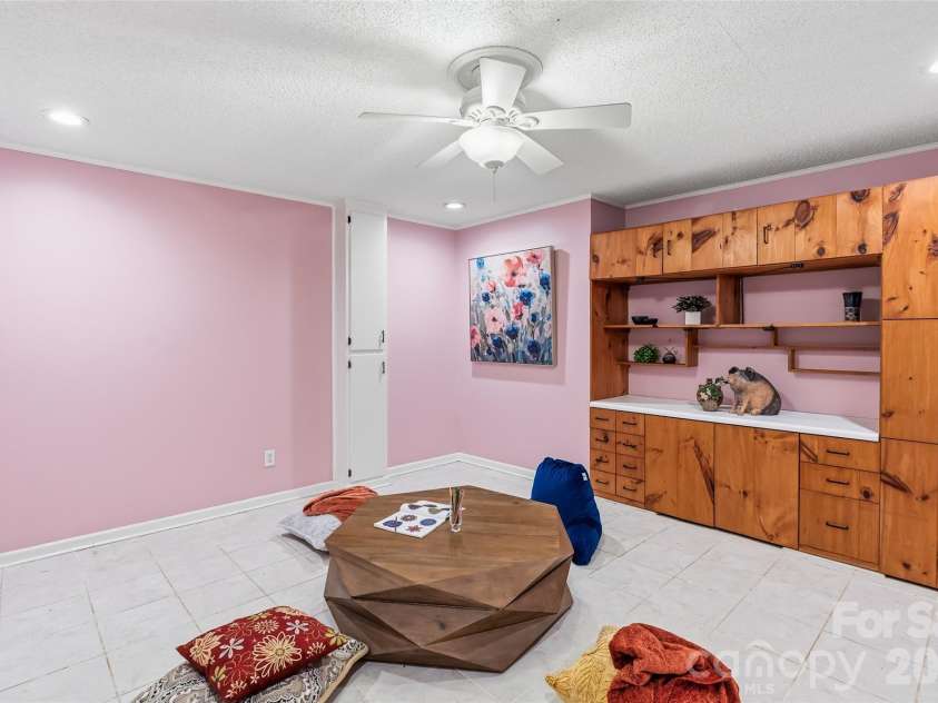 16 Canterbury Drive, Arden, NC 28704.  MLS# CAR4396207, YatesRealty ID 32349. Office are with built in's downstairs