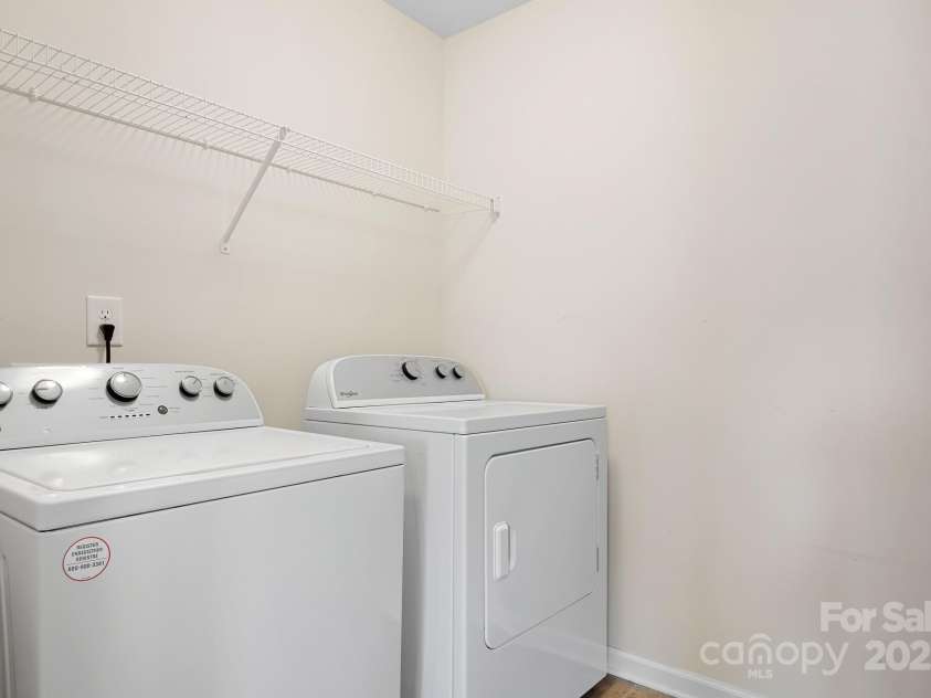 7217 Kenyon Drive, Denver, NC 28037.  MLS# CAR4233366, YatesRealty ID 3235. Laundry room upper level with storage