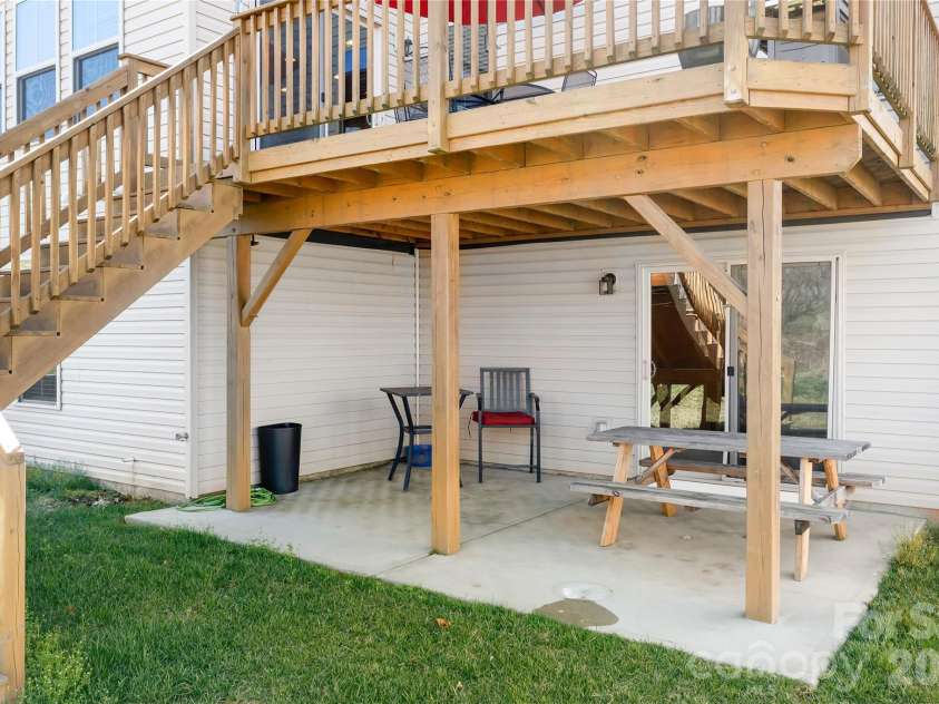 7217 Kenyon Drive, Denver, NC 28037.  MLS# CAR4316332, YatesRealty ID 3235. Patio area under the deck 