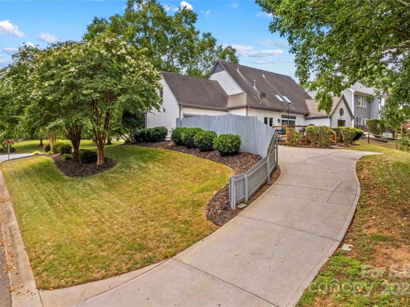 586 Highland Ridge Road, Mooresville, NC 28115.  MLS# CAR4287647, YatesRealty ID 32354. Private Driveway Entrance behind Home