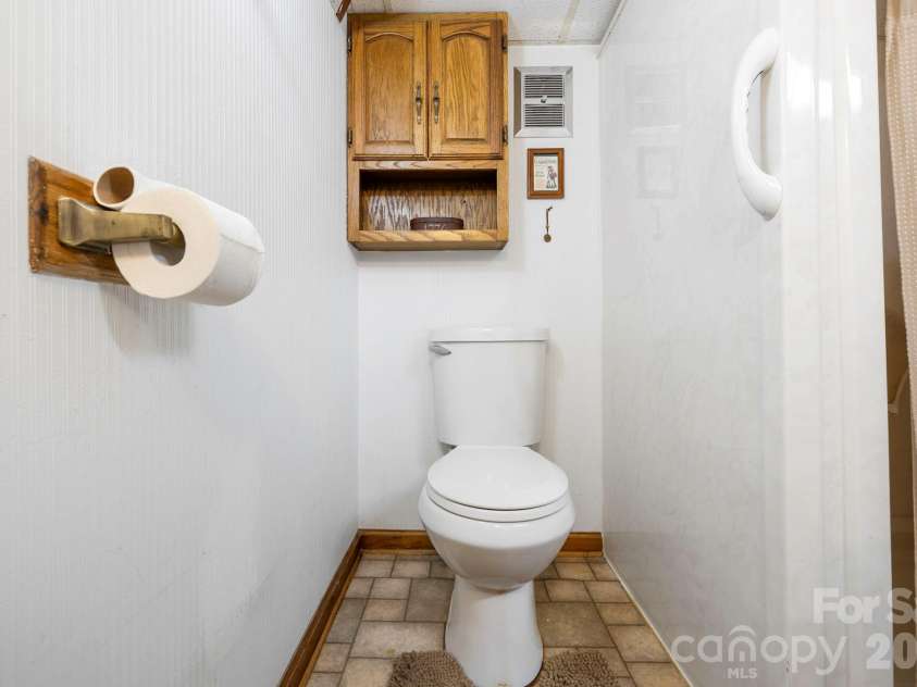 71 Laurel Mountain Road, Brevard, NC 28712.  MLS# CAR4370295, YatesRealty ID 32354. Basement bathroom