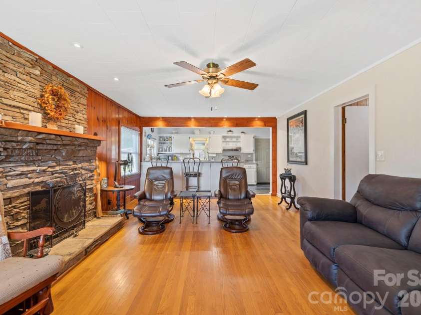 71 Laurel Mountain Road, Brevard, NC 28712.  MLS# CAR4370295, YatesRealty ID 32354. View from living room looking into the kitchen