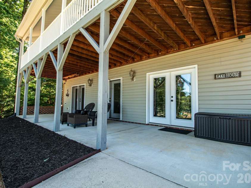 794 Riverwood Drive, Lexington, NC 27292.  MLS# CAR4389743, YatesRealty ID 32356. Covered patio lower level