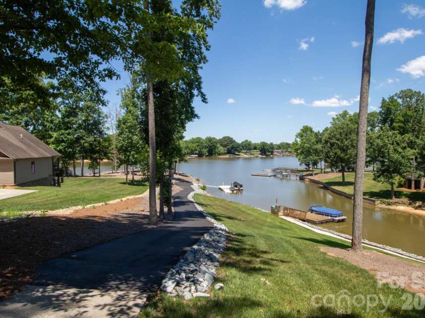 794 Riverwood Drive, Lexington, NC 27292.  MLS# CAR4389743, YatesRealty ID 32356. Golf cart path