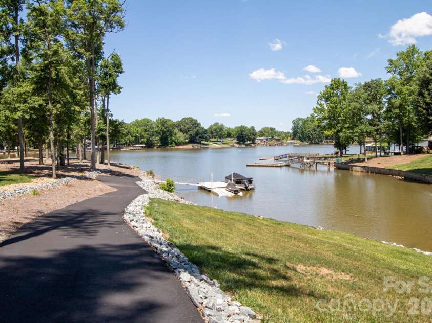794 Riverwood Drive, Lexington, NC 27292.  MLS# CAR4389743, YatesRealty ID 32356. Golf cart path