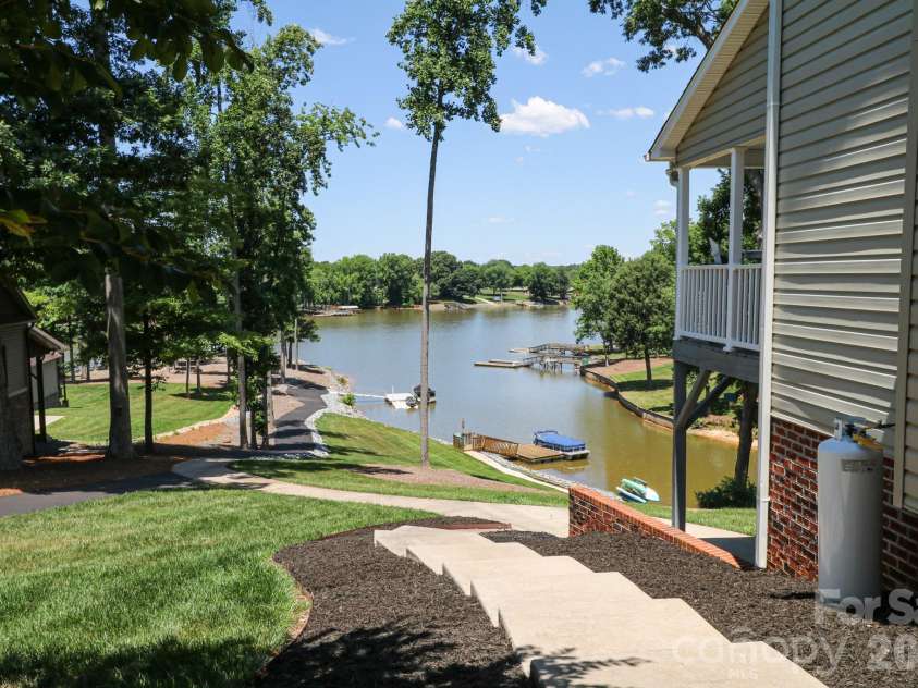 794 Riverwood Drive, Lexington, NC 27292.  MLS# CAR4389743, YatesRealty ID 32356. Side path to lake