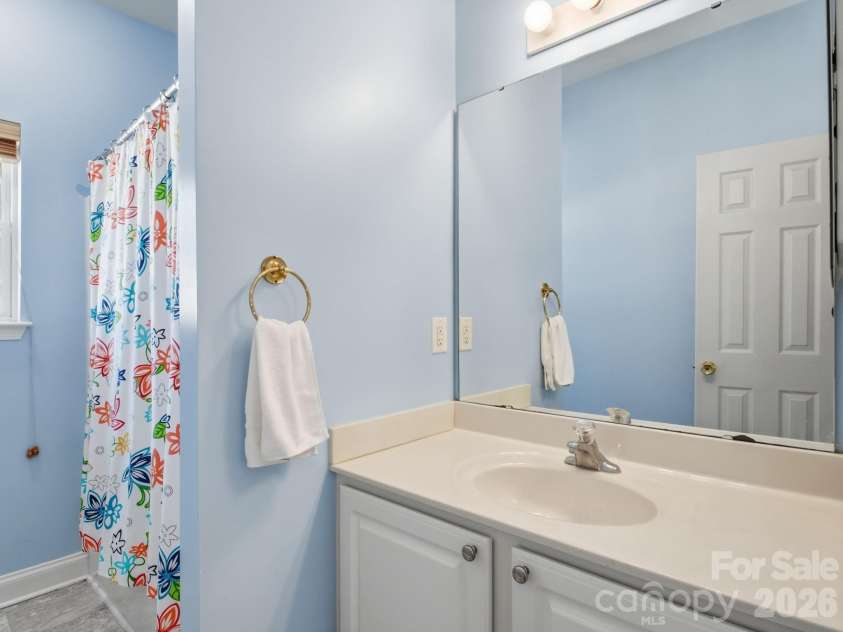 12519 Twelvetrees Lane, Huntersville, NC 28078.  MLS# CAR4375770, YatesRealty ID 32361. Guest Bathroom